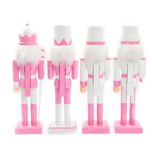 Detailed rear view of four 38cm tall pink and white wooden nutcracker soldier figures