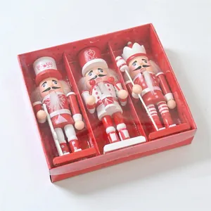 Set di tre marionette schiaccianoci natalizie in legno da 15 cm in confezione rossa