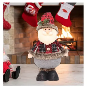 Plush Christmas Santa Claus doll decoration for festive holiday home atmosphere