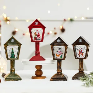 Vintage-Weihnachtslaternen in Briefkastenform mit Wasserfüllung und festlichen Figuren