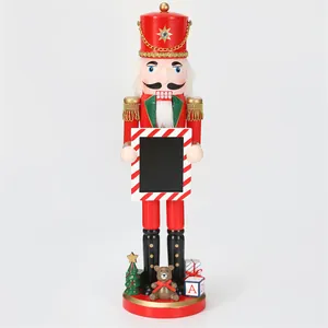Close-up view of 38cm decorative wooden Nutcracker soldier holding a candy cane photo frame