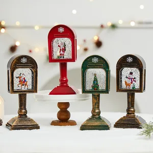 Set of four retro Christmas snow globe lanterns with Santa and snowman motifs for decor