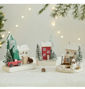 Handcrafted wooden Christmas village houses with snow finish for tabletop holiday decor