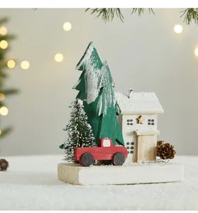 Rustic wooden Christmas house ornament with pine trees and red truck on snowy base