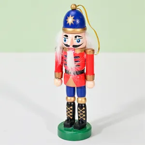 Detailed view of a 12.5cm wooden nutcracker soldier ornament with a gold hanging loop.