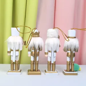 Set de quatre suspensions casse-noisette blanc et or haut de gamme pour sapin de Noël