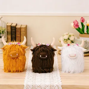 Detailed view of three colorful Highland Cow plush toys featuring cute flower crowns