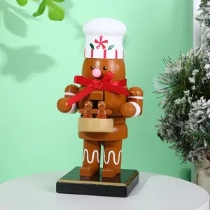 Cascanueces de madera de 16 cm con diseño de chef de jengibre y un gran lazo rojo