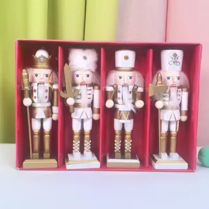 Lot de 4 figurines de casse-noisettes traditionnelles or et blanc en boîte rouge