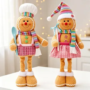 Detailed view of two Christmas plush gingerbread man ornaments with telescopic legs