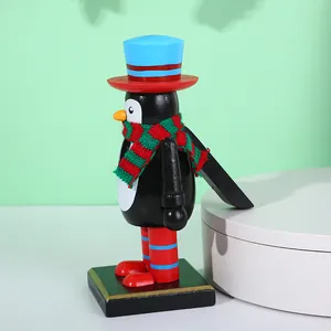Cascanueces de madera de 16cm con forma de pingüino, bufanda y sombrero navideño decorativo
