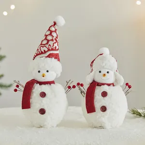 Two festive plush Christmas snowman figurines for holiday home and shop window display
