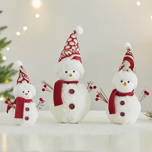 Set of three decorative Christmas snowman dolls in varying sizes for holiday decor