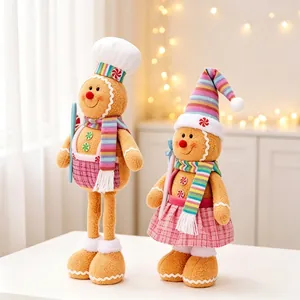 Detail of Christmas gingerbread man plush ornaments with chef hat and pink plaid skirt