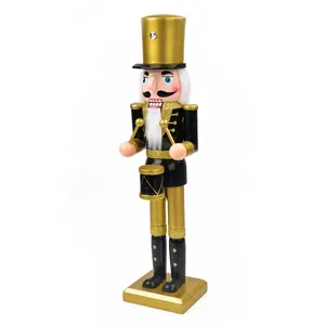 Detailed 38cm wooden drummer nutcracker soldier in black and gold Christmas finish