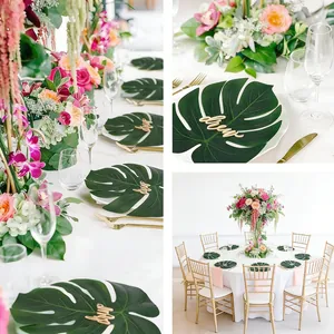 Elegant table setting showcase using artificial Monstera leaves as stylish place card holders