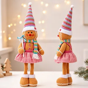 Detailed view of plush gingerbread figures in pink plaid skirts for Christmas decor