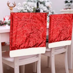 Red sequin Christmas chair covers with white plush trim for holiday dining room decor