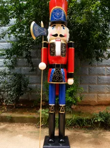Full view of a 1.8m large wooden Christmas nutcracker soldier ornament with axe.