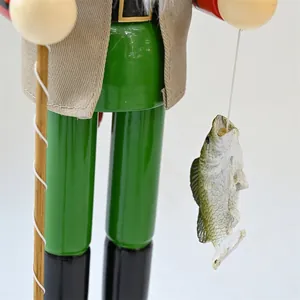 Detailed macro shot of a Nutcracker fisherman figurine holding a rod and caught fish