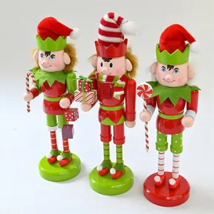 Three 25cm red and green wooden Christmas elf nutcracker figurines for desktop decoration