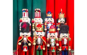 Eight diverse 38cm wooden nutcracker soldier puppets for classic Christmas table decor