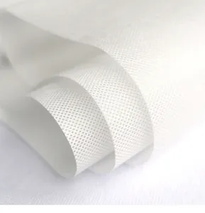 High-quality close-up macro detail of white non-woven fabric texture for decorations
