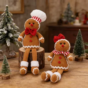 Pluche kerst peperkoekpop paar met lange benen en een koksmuts voor huisdecoratie