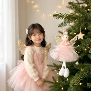 Exquisite pink plush Christmas angel doll ornament with glitter wings on a festive tree