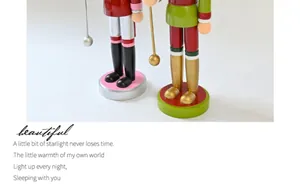 Detailed view showing the feet and bases of 38cm wooden nutcracker soldier puppets.