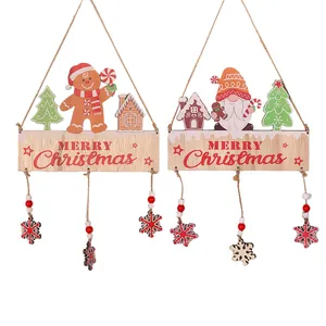 Deux ornements de Noël en bois avec motifs de bonhomme de pain d'épices et gnome