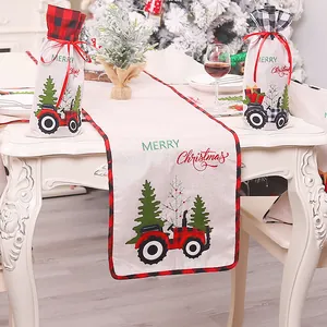 Linen Christmas table runner and wine bottle covers with red plaid tractor motif