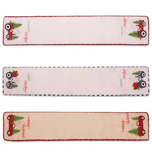 Festive Christmas table runner set featuring creative tractor and tree designs on burlap