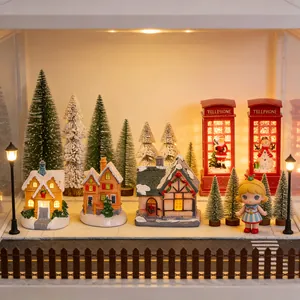 Detailed miniature Christmas village scene with glowing cottages, snowy pines and doll