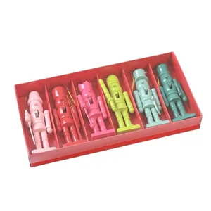 Set of six 13cm colorful wooden nutcracker soldier ornaments displayed in a red gift box