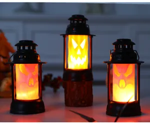Detailed view of three glowing orange Halloween lanterns with spooky faces