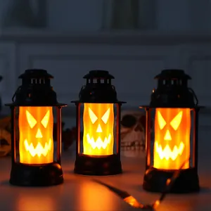 Set of three orange Halloween LED lanterns with pumpkin face designs for festive party decor