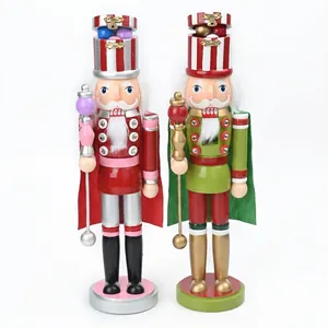 Two classic 38cm wooden Nutcracker soldier figures for festive Christmas decoration
