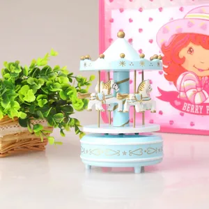 Blue carousel music box featuring white horses for home decor and cake decoration