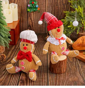 Adorable Christmas gingerbread man plush dolls set in a warm festive holiday scene