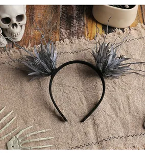 Gothic Halloween headband featuring grey leaf clusters and twigs on a burlap background