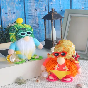 Pair of cute beach gnomes in summer swimsuits with sunglasses and sea shell decor