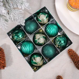 Set di 9 palline di Natale verdi con texture assortite presentate in una confezione regalo