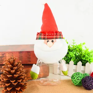 Détail du pot à bonbons Père Noël en plastique avec couvercle figurine festive