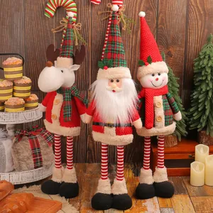 Lot de 3 poupées de Noël sur pied avec jambes extensibles pour décoration de vitrine.