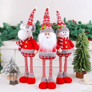 Lot de trois poupées de Noël télescopiques en peluche avec Père Noël, renne et bonhomme de neige.