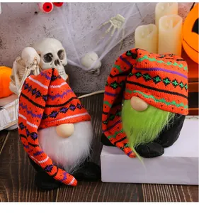 Two Halloween gnomes with long knitted hats and furry beards for festive tabletop decor