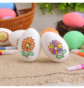 Detailed macro view of hand-painted foam Easter eggs featuring colorful floral designs