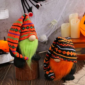 Pair of Halloween plush gnomes featuring long knitted hats and vibrant green or orange beards.