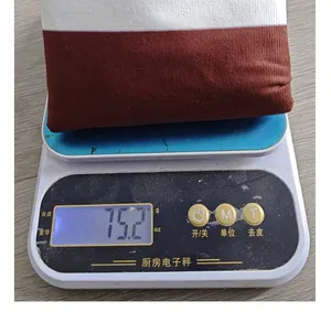 Detailed view of the harvest theme pillow cover weight showing exactly 75.2 grams